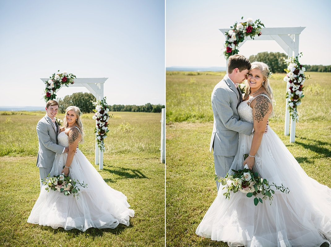 bride and groom wedding photos on love mountain at the wedding barn in arkansas