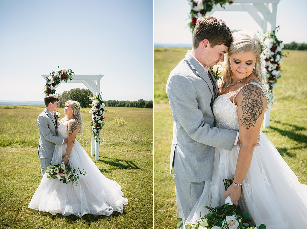bride and groom wedding photos on love mountain at the wedding barn in arkansas