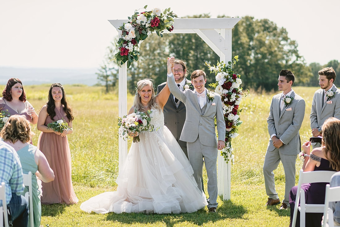 wedding photos on love mountain at the wedding barn in arkansas