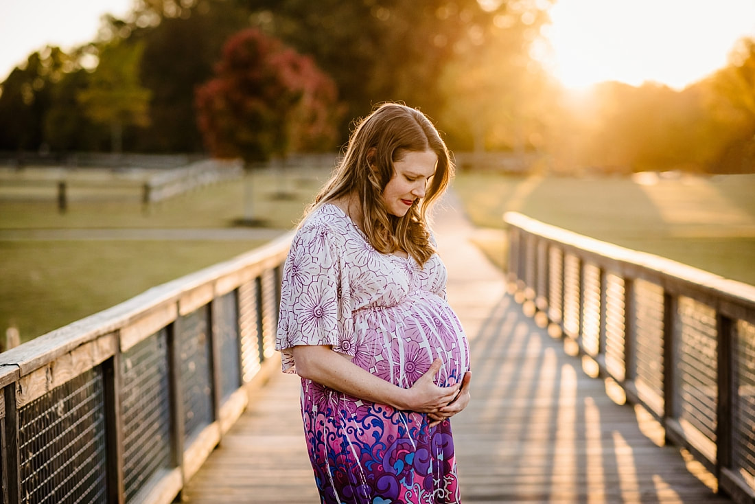 fall maternity photos at Hinton Park in Collierville, TN during golden hour