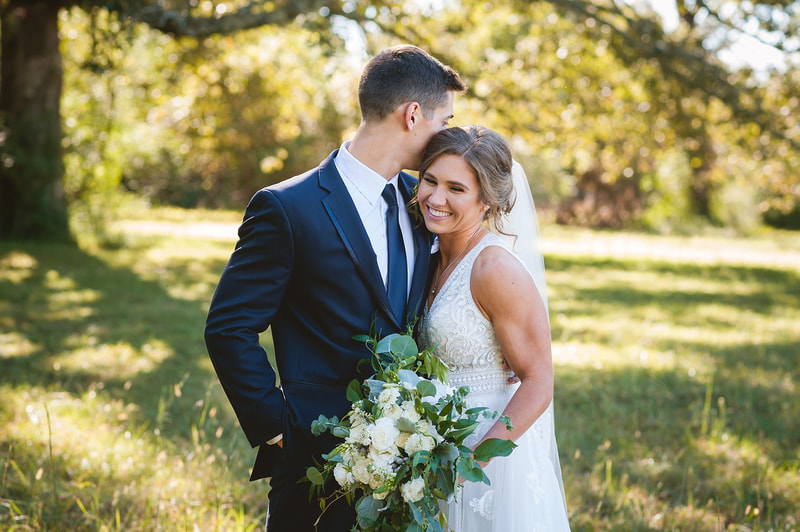 Bride and Groom Portraits in a field in Collierville, TN across the street from St. Patrick Presbyterian Church