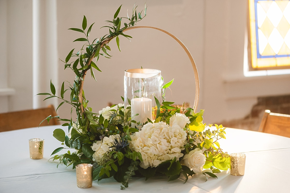 the centerpieces at the wedding reception at the robinson gallery