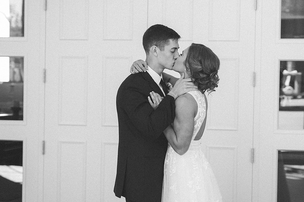 bride and groom kissing
