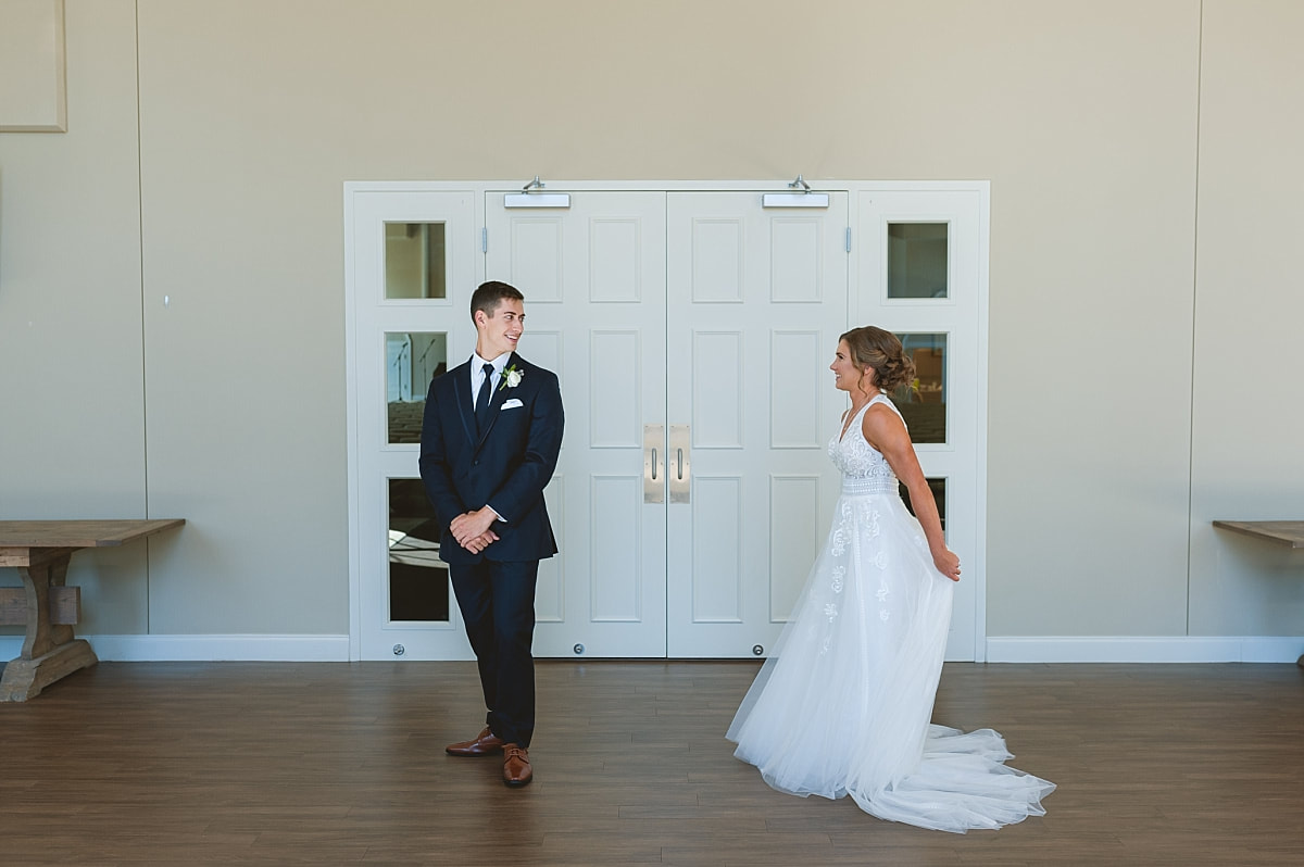 groom turning around to see his bride for the first time