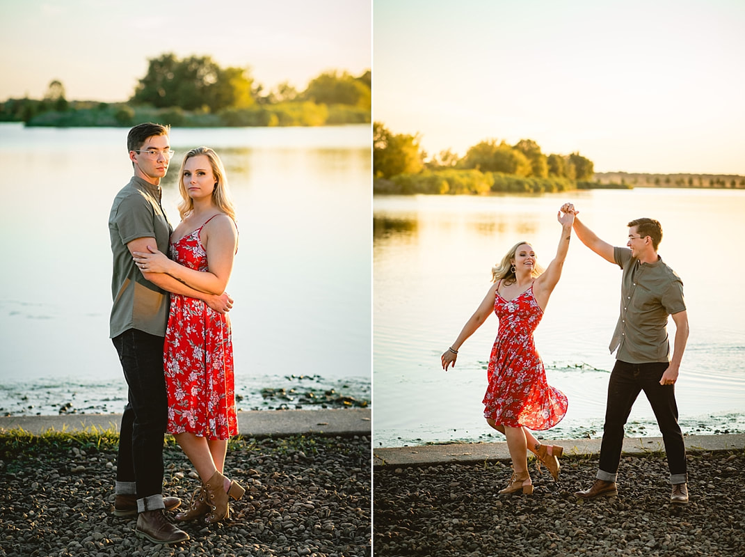 couple posing for engagement photos by the lake at shelby farms park in memphis, tn