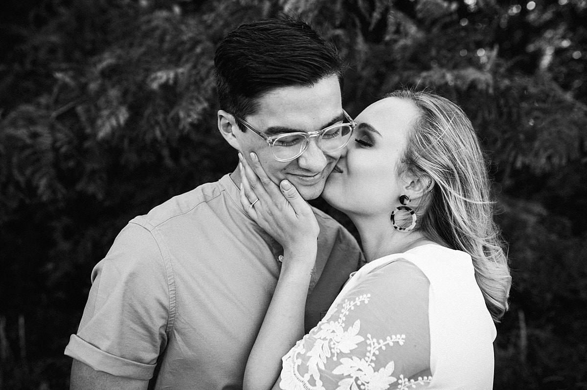 couple posing for engagement photos at shelby farms park in memphis, tn