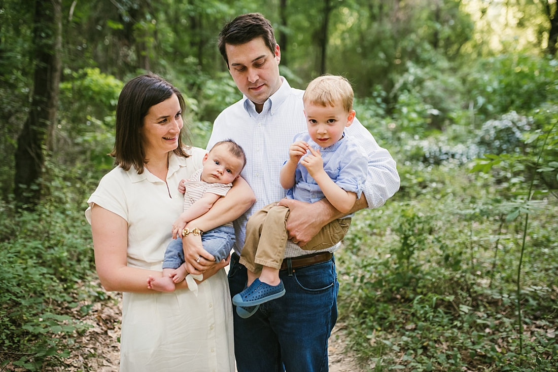 family portrait in the woods at Shelby Farms
