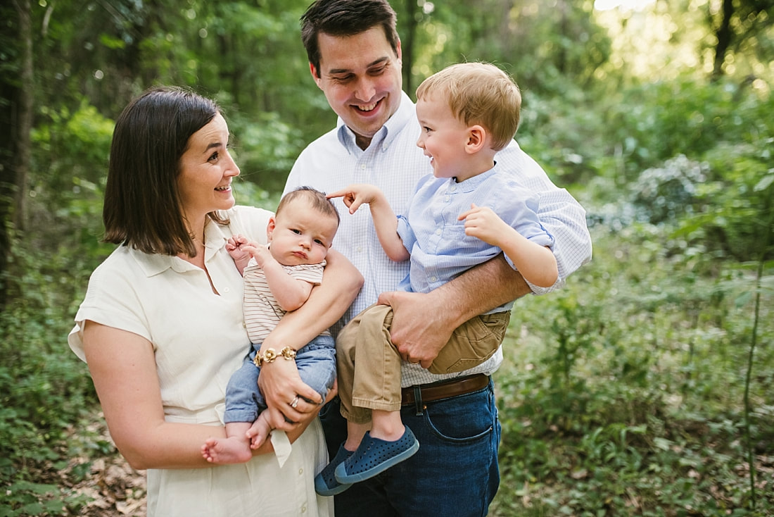 family portrait in the woods at Shelby Farms