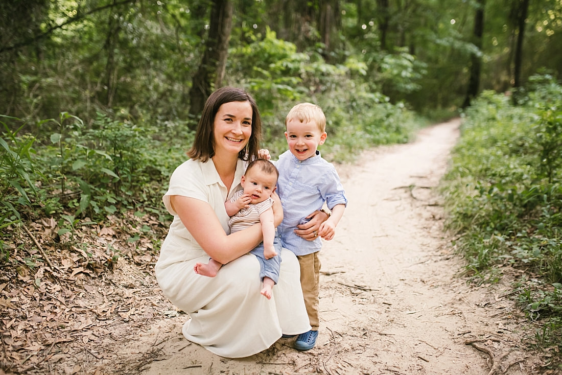 family portrait in the woods at Shelby Farms