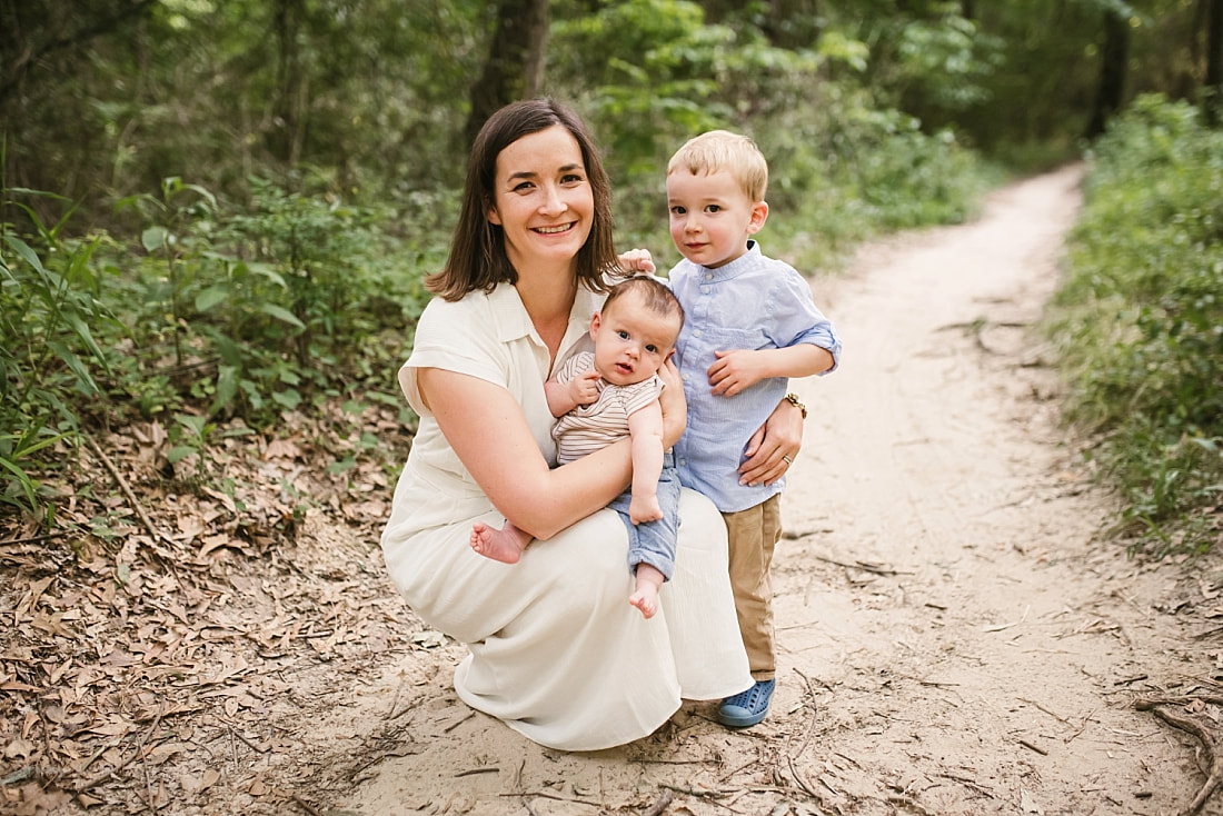 family portrait in the woods at Shelby Farms