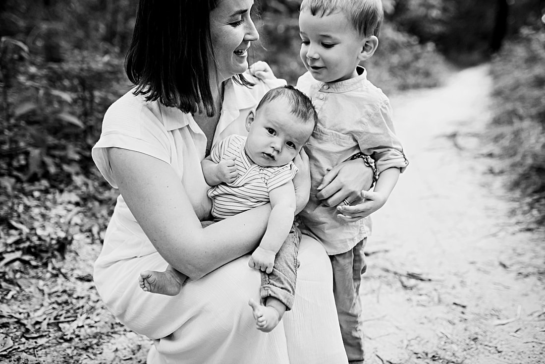 family portrait in the woods at Shelby Farms