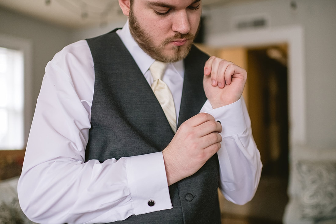 groom getting ready for wedding, Memphis wedding photographer
