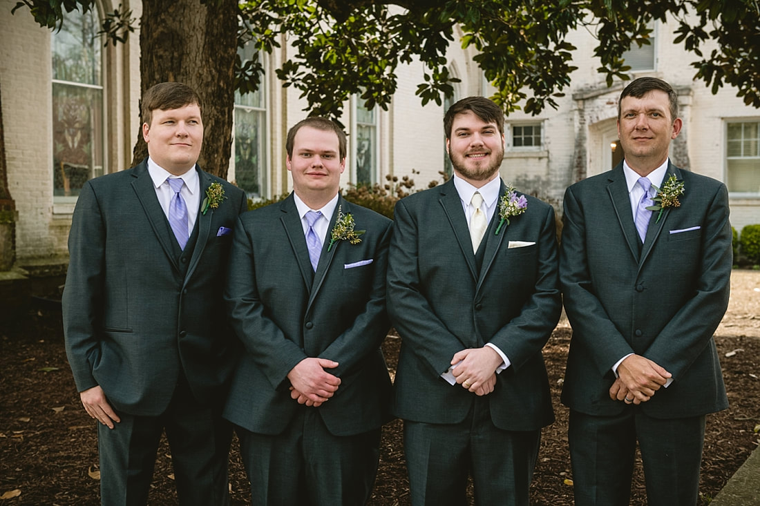 Groom with groomsmen portraits outside of Fillmore street Chapel, Corinth, MS