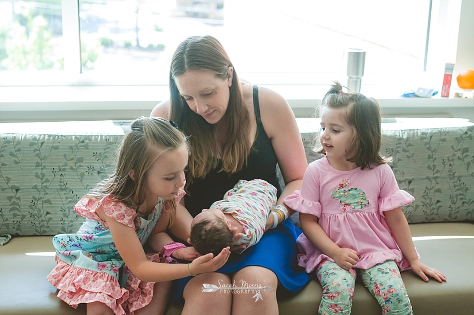 Mother with all of her children on the couch in her post partum recover room at Methodist Le Bonheur Germantown Hospital