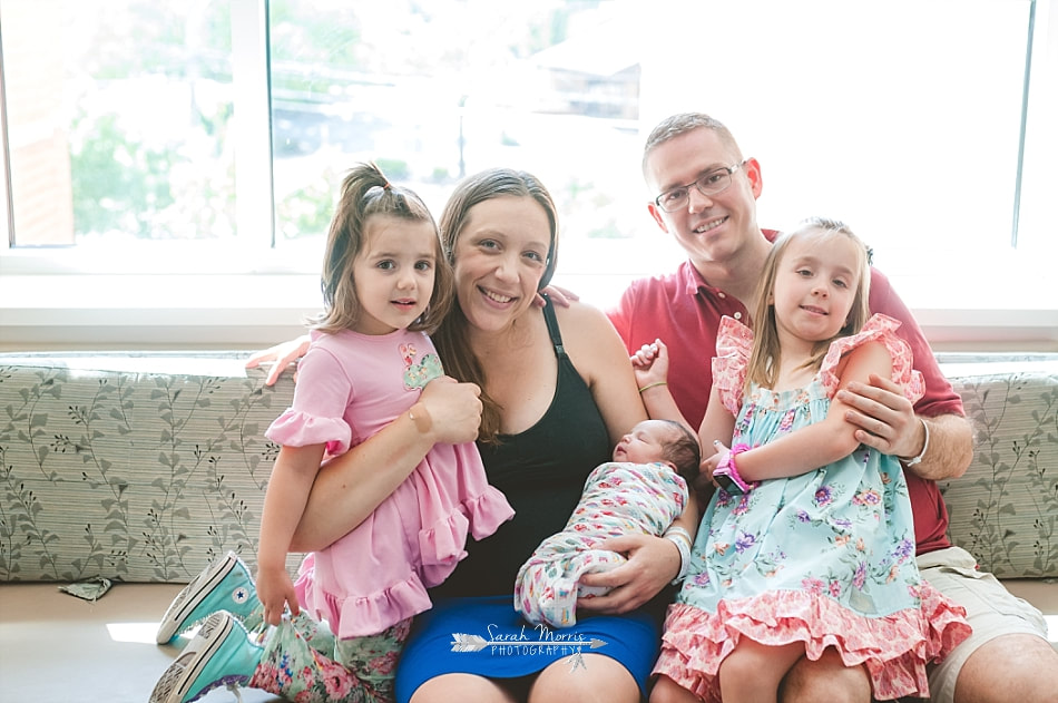 Family photo with the newest member at Methodist Le Bonheur Germantown Hospital