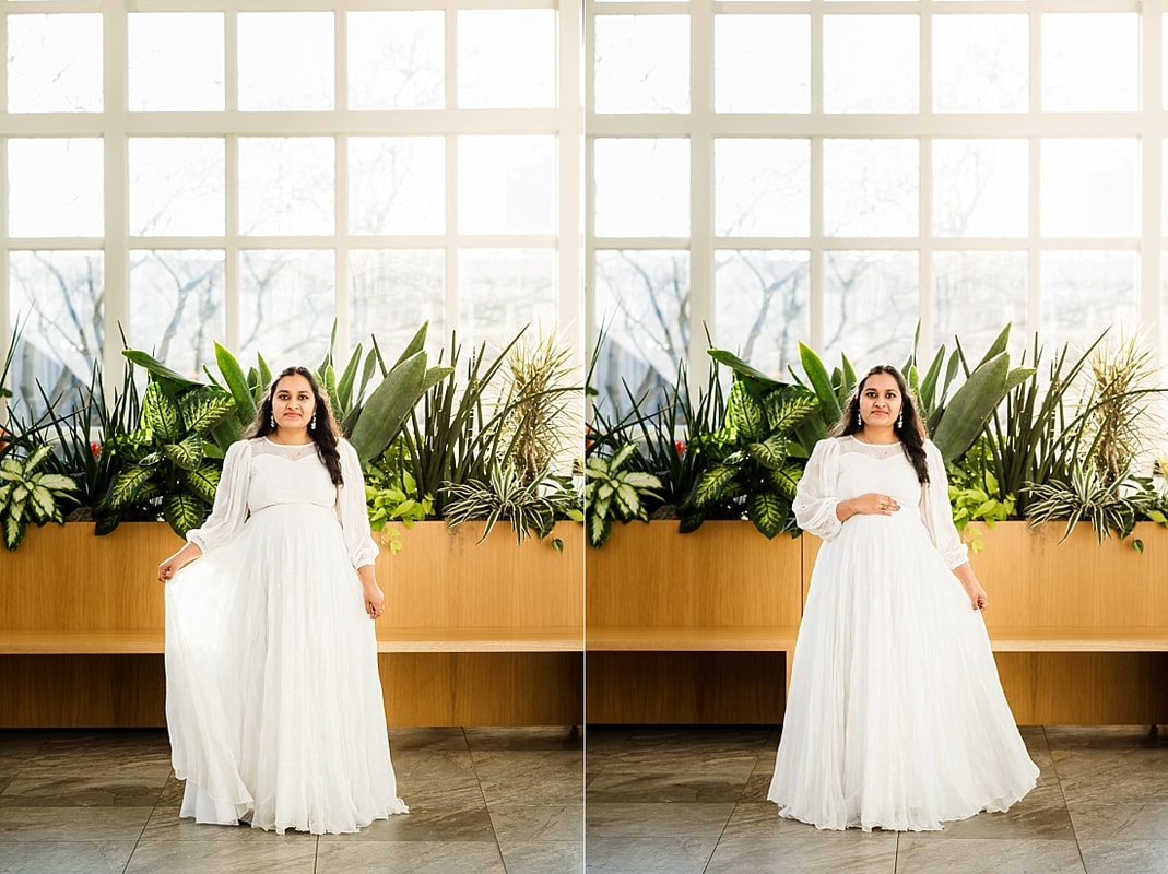 maternity portrait of mother wearing white indian dress in greenhouse at memphis botanic garden