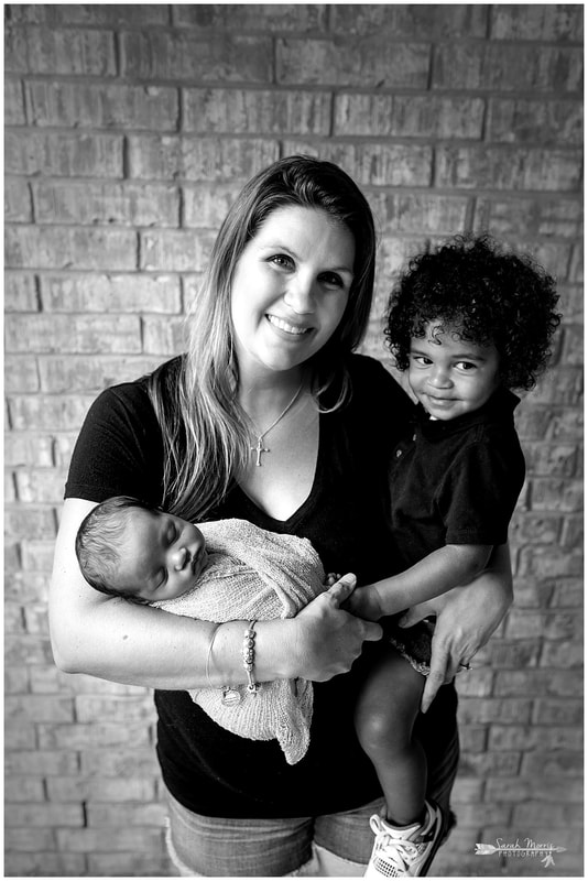 newborn photos of baby girl with mother and toddler sibling