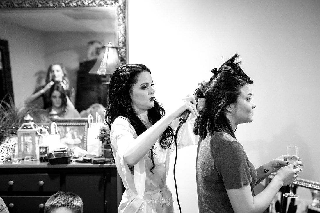 bride doing bridemaid's hair at Overton Chapel, Memphis Wedding Photographer