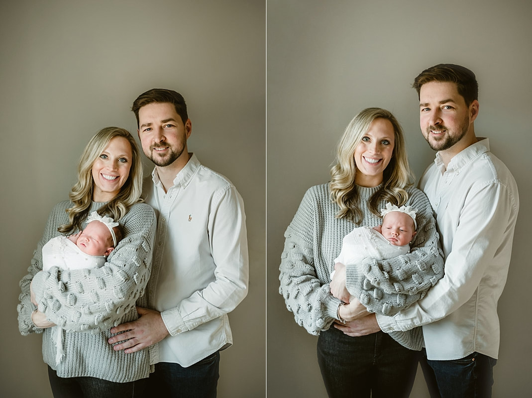 parents with newborn baby girl for newborn portraits in Memphis, TN