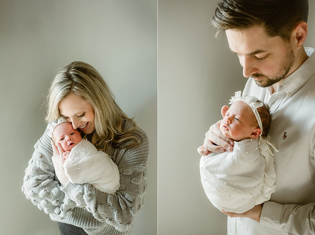 parents with newborn baby girl for newborn portraits in Memphis, TN
