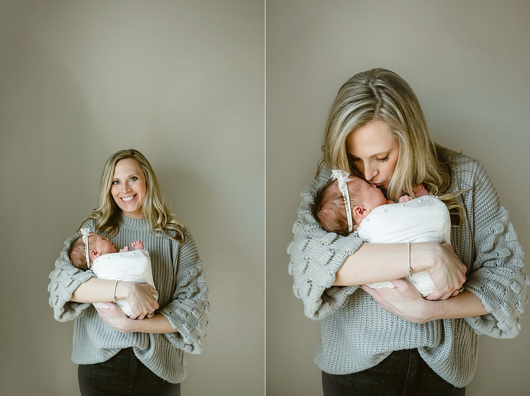 parents with newborn baby girl for newborn portraits in Memphis, TN