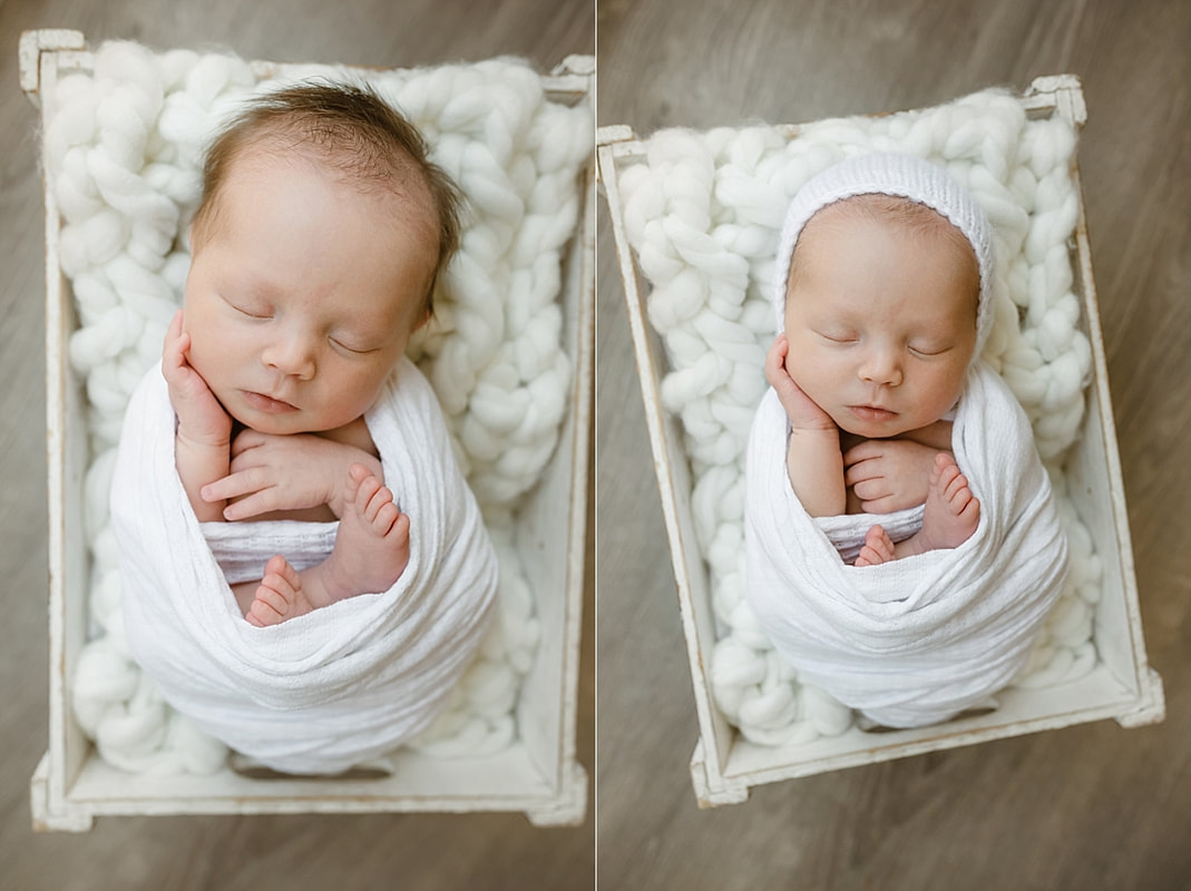 baby girl swaddled in white blanket, sleeping in basket for newborn photos in Memphis, TN