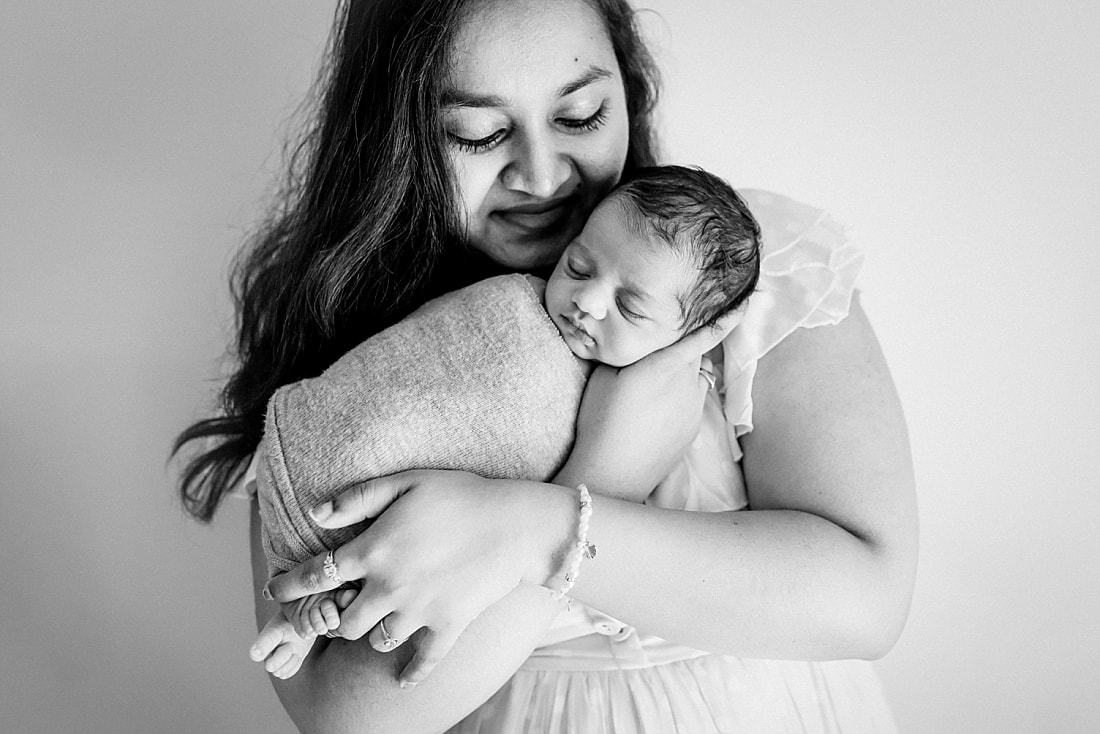 mother smiling down at baby in memphis