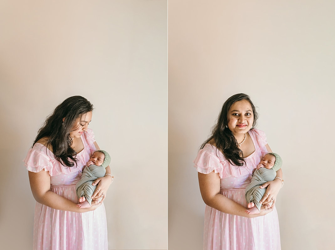 mother holding newborn baby boy during newborn session in memphis