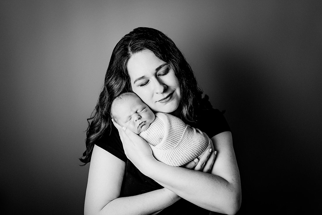 newborn baby with mom for newborn photos in Memphis, TN