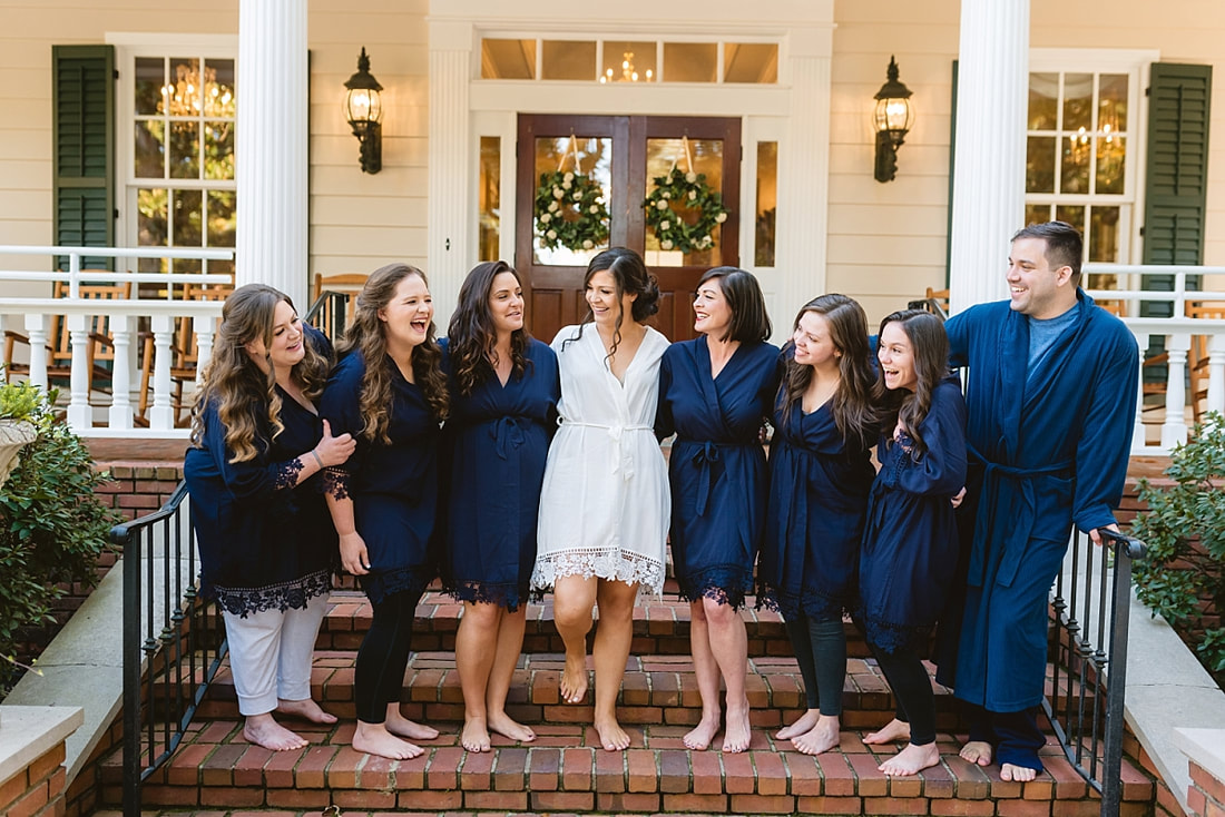 bride laughing with her bridesmaids at Orion Hill in Arlington, TN