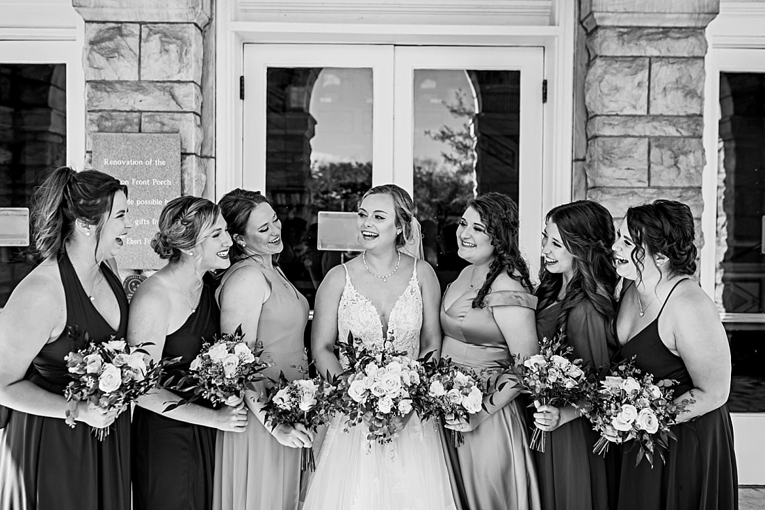 bride laughing with bridesmaids + Pink Palace Wedding + Memphis, TN