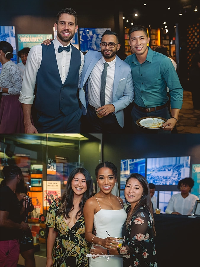 Wedding guests posing with the bride and groom at the Stax Museum