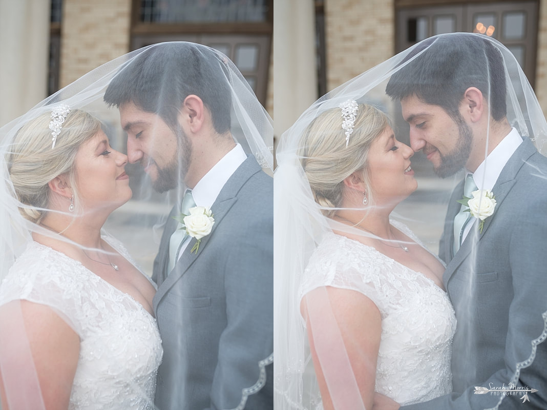 Bride and Groom under wedding veil at Annunciation Greek Orthodox Church in Memphis, TN